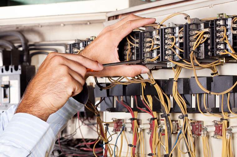 EPE technicians at work on a panel board